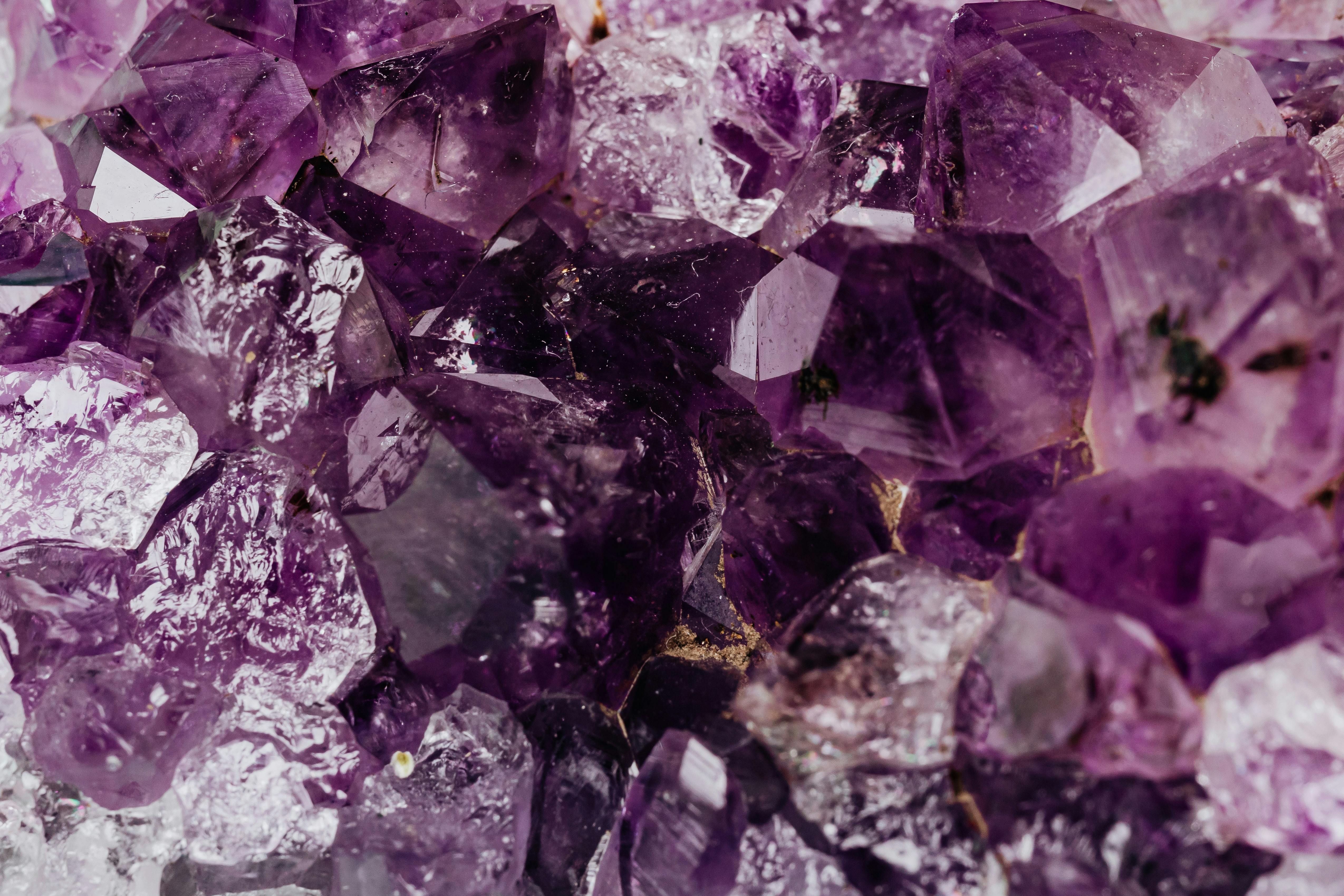 Photo by Karola G: https://www.pexels.com/photo/set-of-shiny-transparent-amethysts-grown-together-4040567/