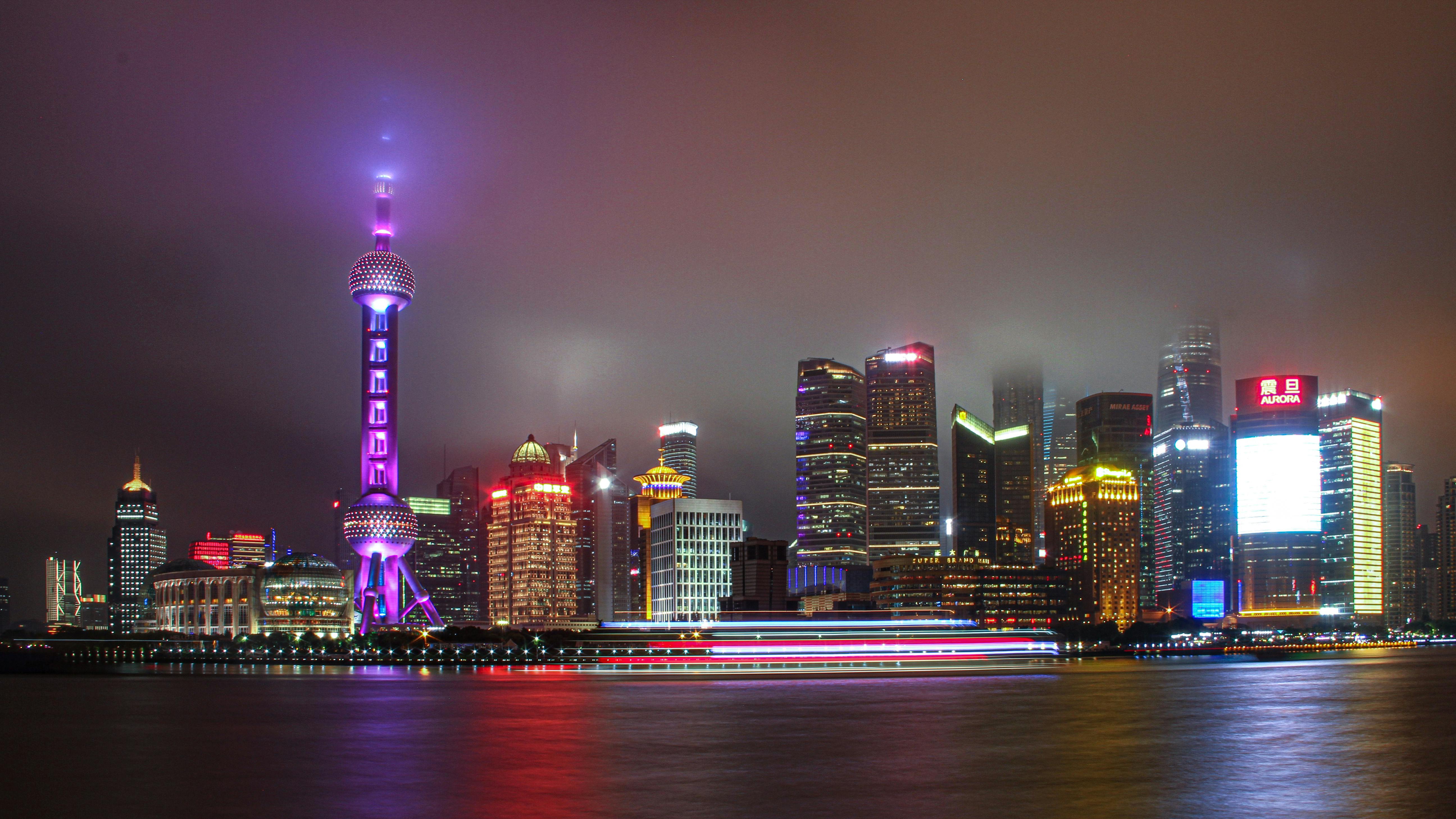 Photo by Shoaib Asif: https://www.pexels.com/photo/shanghai-skyscrapers-by-river-at-night-18096293/